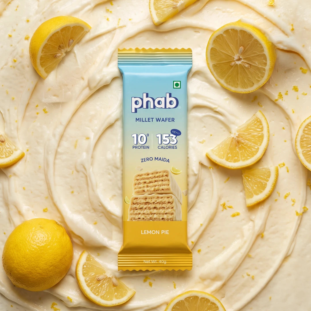 phab's protein millet wafer in the new packaging with the background in swirling cream with lemons all around